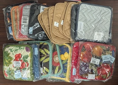 LOT OF 76 NAME BRAND ASSORTED POT HOLDERS *PIC IS THE ACTUAL LOT** - Image 1 of 4