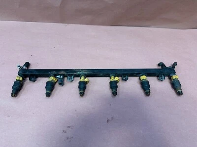 Riel de suministro de combustible BMW E28 535I E24 M30 3,5 L 6 cilindros con inyectores OEM 168 k millas Foto 1 de 4