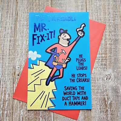 Tarjeta de cumpleaños American Greetings azul Mr. Fix It Superhero lo hace todo Foto 1 de 4