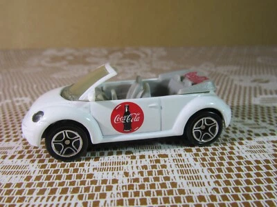 572Z Matchbox 3410EA Cina VW Concept Beetle Cabriolet 1999 Bianco Coca Cola 1:61 - Immagine 1 di 4