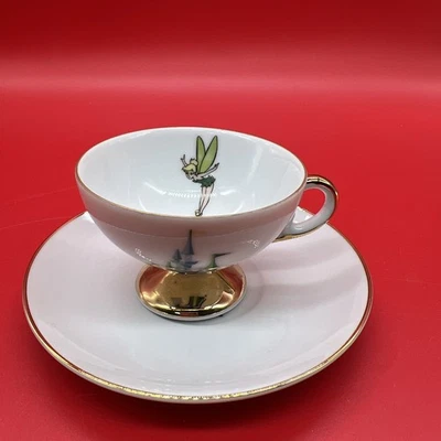 Taza de té y platillo de cerámica Tinker Bell recuerdo Disney Land de colección Japón Foto 1 de 4