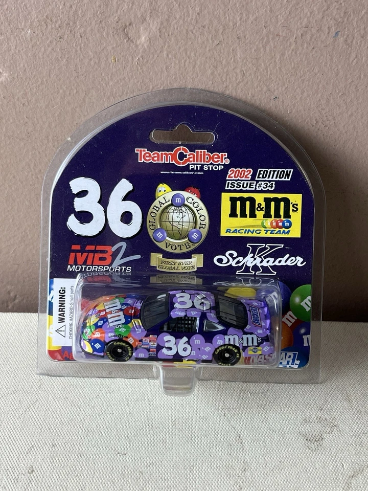 2002 Team Caliber 1:64 Scale #36 Ken Schrader Global Color Vote M&M’s Grand Prix - Image 1 of 4