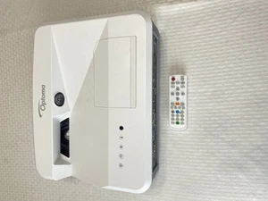 Optoma W319UST Ultra Short Throw Home Cinema Projector HDMI WXGA 31hr DAWSGKUST - Picture 1 of 3