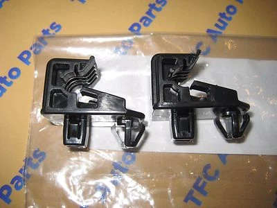 2 soportes de montaje de faros Toyota Lexus Tacoma 4runner Prius Corolla OEM nuevos Foto 1 de 4