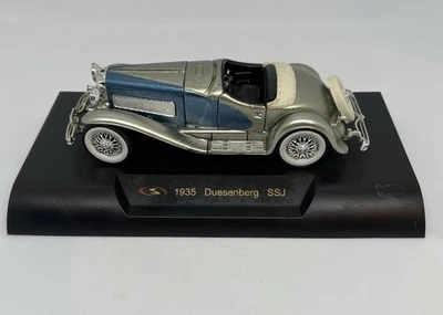 Coche diecast Duesenberg SSJ 1935 modelo Welly escala 1:43 con base de exhibición Foto 1 de 4
