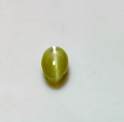 Crisoberilo 1,77 quilates natural ojo de gato piedras preciosas sueltas 7,3X5 cabina amarilla ovalada A-304 Foto 1 de 4