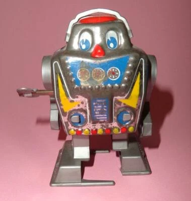 VTG YONE JAPAN MINI TIN PLASTIC CLOCKWORK SPACE ROBOT w/ ORIGINAL KEY 1960's - Image 1 of 4