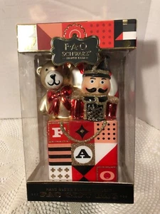 FAO Schwarz Bear and Nutcracker Gift Bag Glass Christmas Tree Ornament - Picture 1 of 5