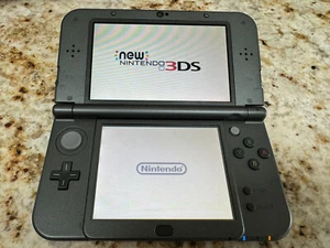 Nintendo ‘New’ 3DS XL Console Metallic Black - Used - Picture 1 of 3