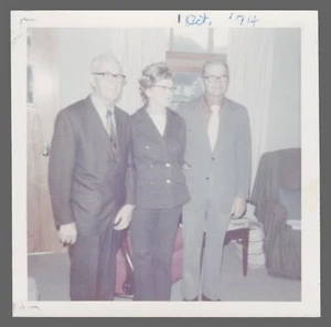 Found Photo 1974 3 Older People In Front of Window 3.5 x 3.5 - Picture 1 of 2