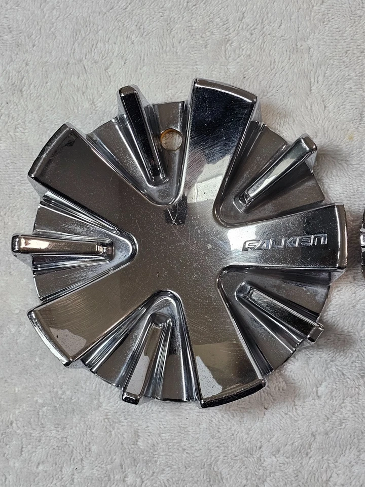 Tapacubos Falken LG0605-17 cromados 878L156 - 6" buen estado Foto 1 de 4