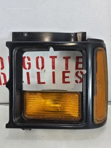 1987-90 Dodge Dakota Left Side Headlight Bezel Corner Light 55025375 - Picture 1 of 5