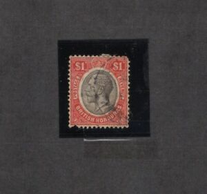 British Honduras 101 -  George V.  $1.00 Single. Used. Fault.   #02 BHOND101