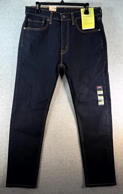 Pantalones de mezclilla para hombre Levi's 506 33 x 32 azul elástico lavado oscuro cómodos ajuste recto Foto 1 de 4