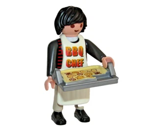 Playmobil Pastelero con Bandeja de Pasteles de Navidad y BBK sobre Chef City Life - C3 - Imagen 1 de 4