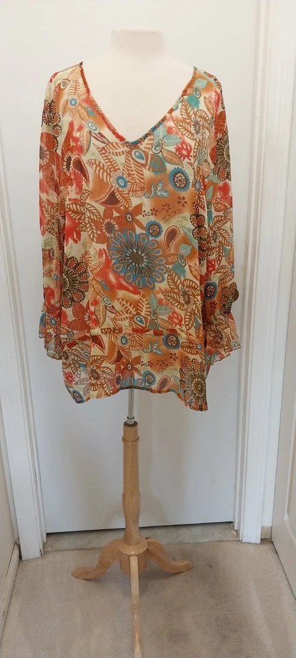 Túnica mujer R.Q.T. multicolor naranja turquesa floral mangas largas con volantes usada 3X Foto 1 de 3