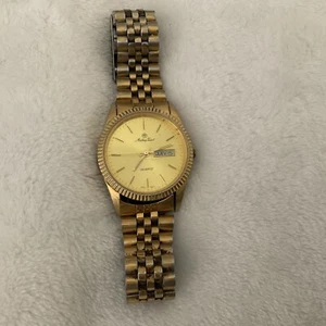 VINTAGE MATHEY TISSOT Day Date QUARTZ GOLD TONE MENs WATCH JAPAN Movement - Picture 1 of 4