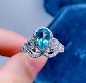 1.90Ct Pear Shaped Lab Created Light Blue Topaz Halo Women Ring In 935 Silver - Picture 1 of 6