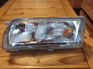Nissan Primera P10 N/S LEFT Headlight Brand New Genuine Part 1990/96 - Picture 1 of 5