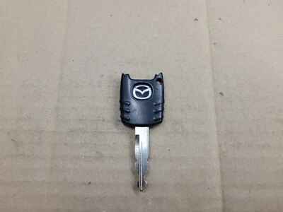Mazda OEM Factory Black & Chrome Ignition Door Key - Image 1 of 2