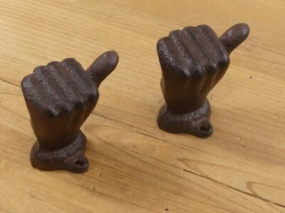 2 ganchos de hierro fundido montados en la pared perilla de puerta tiradores pulgares hacia arriba cajón tirador pesado Foto 1 de 4