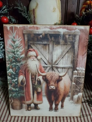 DARLING PRIMITIVE FARM BARN VINTAGE STYLE CHRISTMAS HIGHLAND COW AND SANTA SIGN - Image 1 of 4