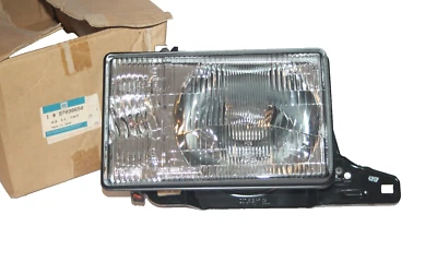 Original Scheinwerfer links Isuzu Trooper Opel Monterey 97038650 4311707 - Bild 1 von 3