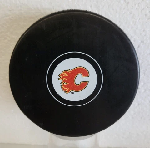 NHL HOCKEY CALGARY FLAMES OFFICIAL TEAM LOGO PUCK QTY! Cover
