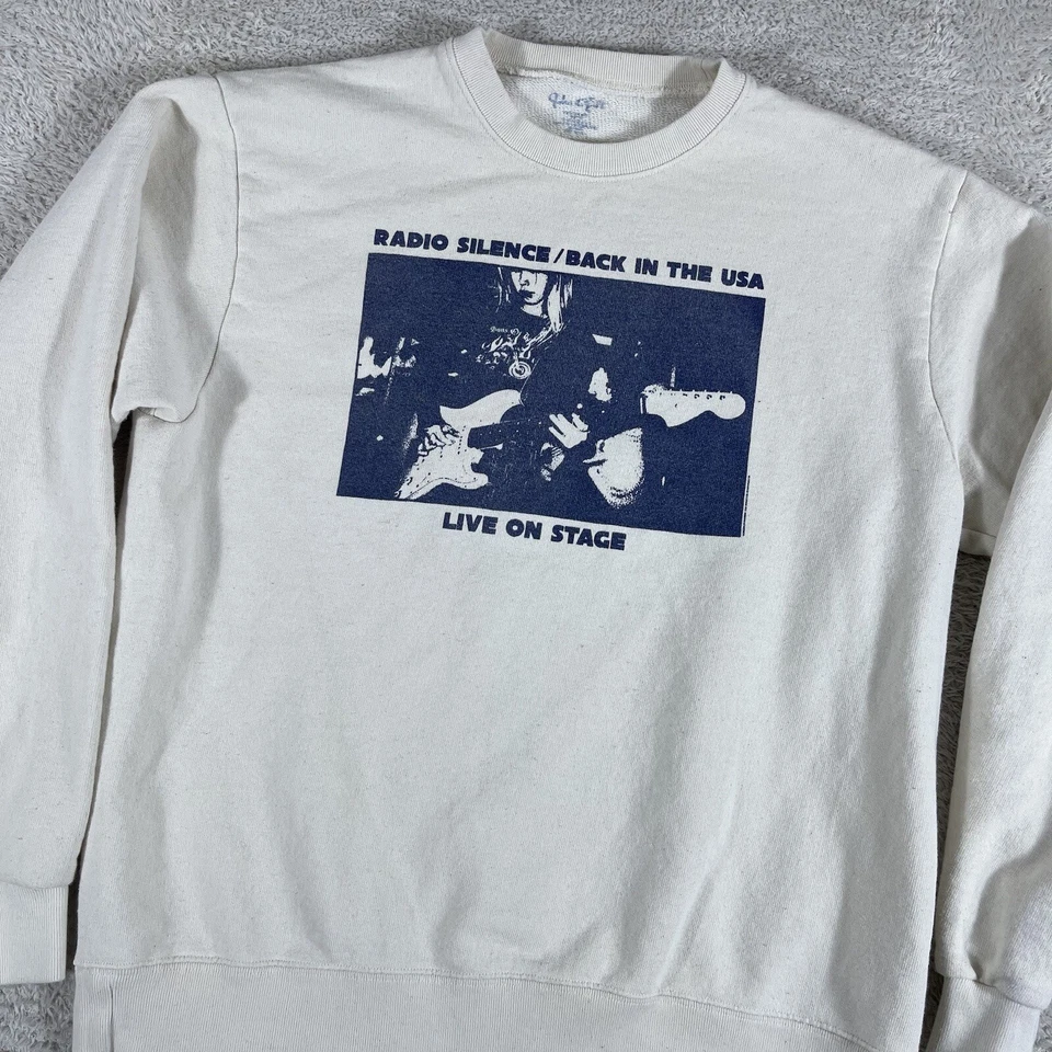 Sudadera Brandy Melville Radio Silence Cuello Redondo OSFA Talla Única Crema Banda Y2K Foto 1 de 4