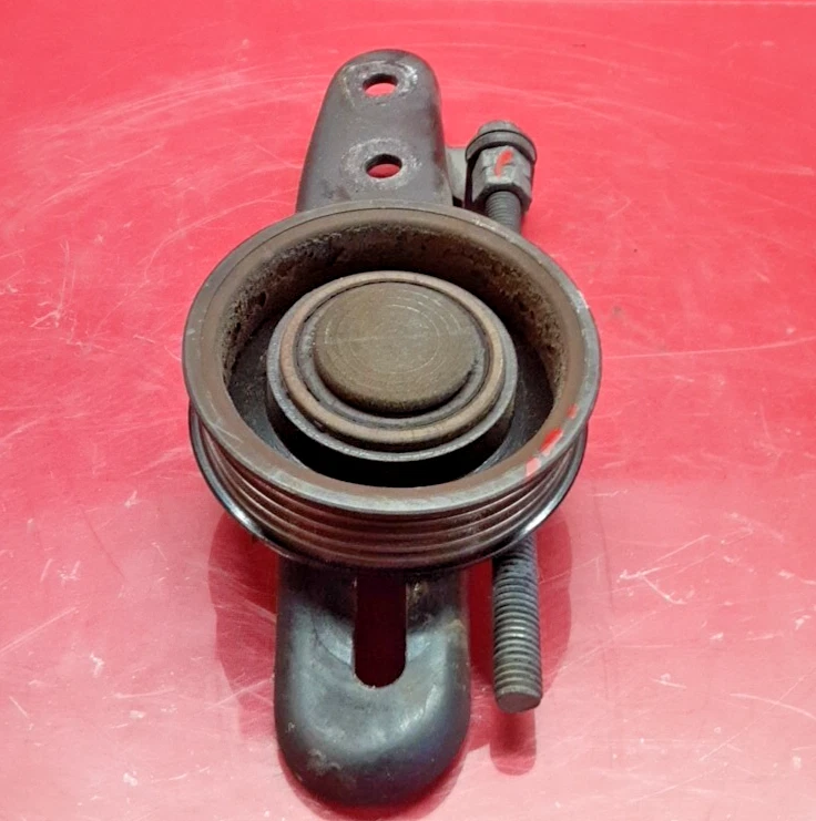 Unidad tensora de correa de motor Subaru Outback 2001 2,5 L 13033AA042 Foto 1 de 4