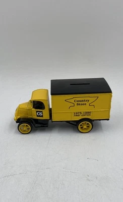 Camión de reparto Ertl 1975-1990 amarillo negro fundido a presión tienda de campo alcancía Foto 1 de 4