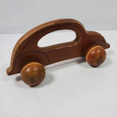 Masajeador automático vintage Volkswagen Bug madera maciza rodante 9,5 pulgadas de largo Foto 1 de 4