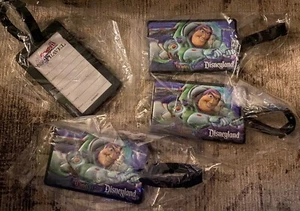 New Lot Of 4 Disneyland Resort Buzz Lightyear Costco Travel Luggage Tags 4”x2.5” - Picture 1 of 3