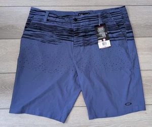 Oakley Wave Herrenshorts Größe 40 Schrittlänge 11" Ohydrolix blau indigo Stretch neu mit Etikett - Bild 1 von 5