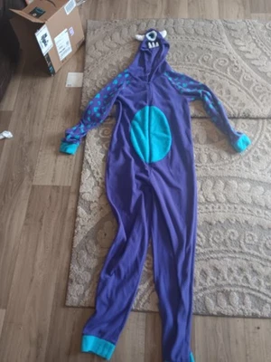 Traje Monster Talla Med... 8 a 10 Pijama de una pieza púrpura polar con capucha Foto 1 de 4