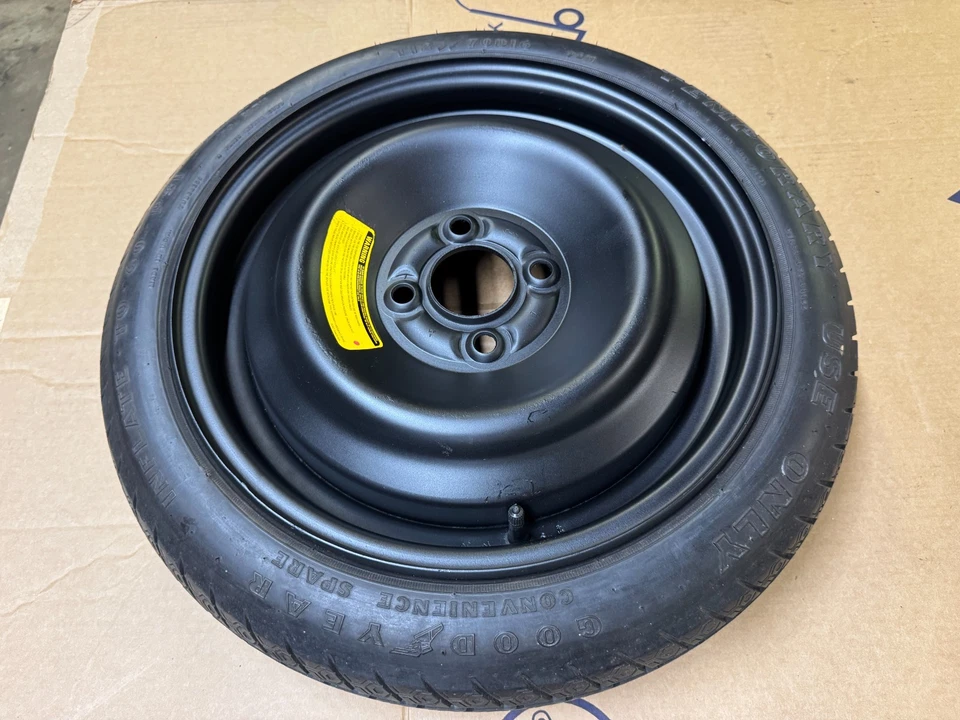 Neumático de repuesto Ford Mustang 87-93 comodidad de fábrica Goodyear 4 orejetas OEM T125/70D16 Foto 1 de 4