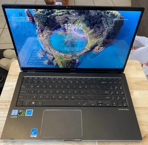 ASUS - 2-in-1 15.6" 4K Ultra HD Touch-Screen Laptop Intel Core i7 - 16GB Memory - Picture 1 of 6