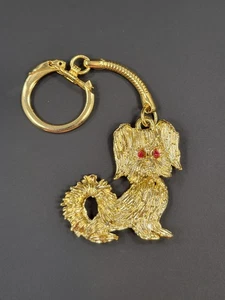 PERRO de metal tono dorado de colección sentado con ojos de joya roja lindo raro - Imagen 1 de 9