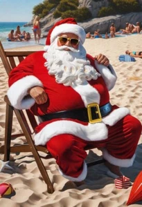 Weihnachtsdekoration Weihnachtsmann sitzt im Liegestuhl - Bild 1 von 1