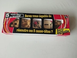 Casse-tête bois : Comète Halley-Anneau de Feu-la Cage-la Croix-Triangle Bermudes - Photo 1/4