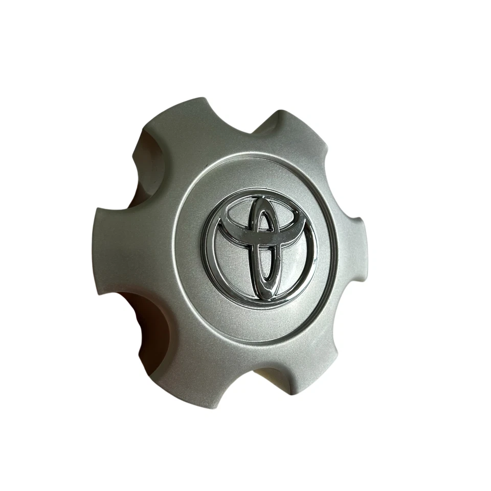 Tapa central plateada para Toyota Tacoma 2005-2015 6 radios cubierta de cubo de llanta de rueda Foto 1 de 4