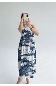Abito elegante tessuto plissettato girocollo senza maniche stampato plissettato gonna spiaggia - Foto 1 di 20