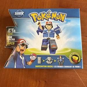 Pokemon IONIX - Ash - Shape Shifting Brick Figure -  NEW SEALED - Picture 1 of 10
