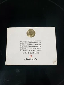 Omega International Warranty Card Paper Booklet good Condition  - Picture 1 of 9