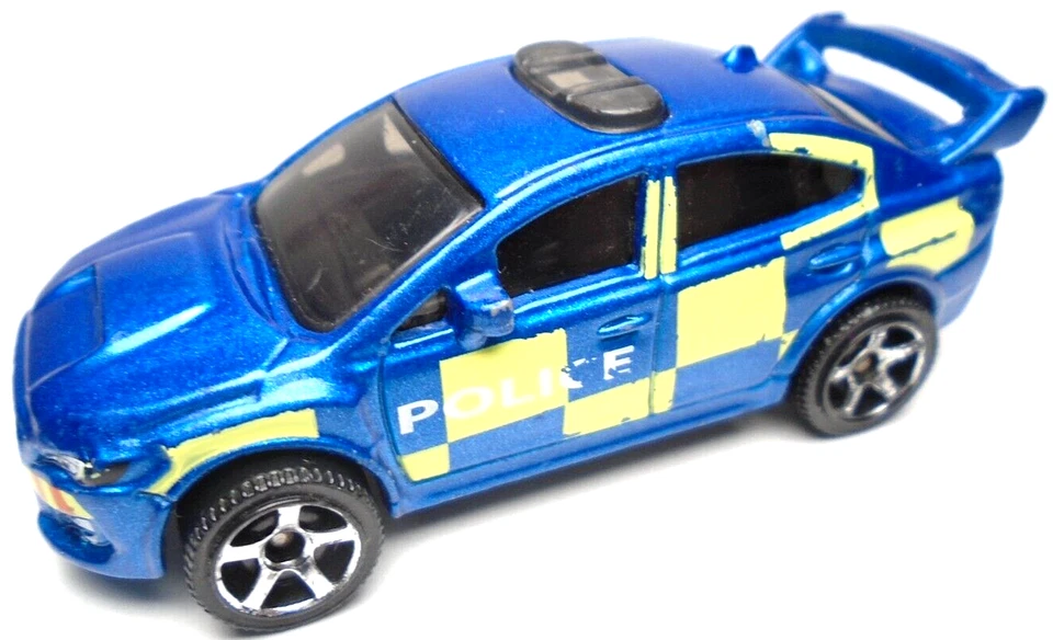 2017 MATCHBOX '15 SUBARU WRX STI BLUE 1:64 DIECAST 2 3/4" POLICE CAR W/ YELLOW - Image 1 of 4
