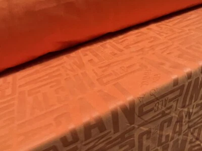 Powder Touch Woven Fabric, Per Metre - Words & Letters Embossed Print - Orange - Image 1 of 3