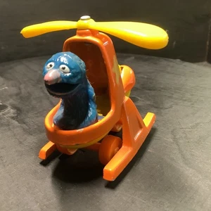 Figura Muppets Inc Heimo Sesamstraße Groby Grover en helicóptero de colección K1 - Imagen 1 de 5