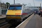PHOTO  CLASS 91 91127 DEPARTS PETERBOROUGH  1Y32 1225 NEWCASTLE TO LONDON KINGS