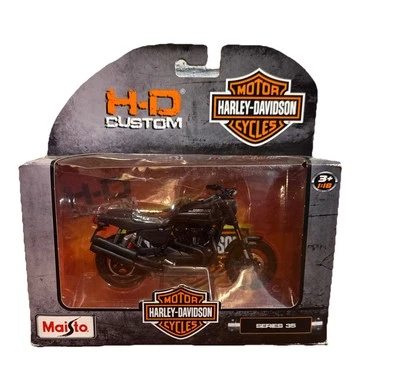 Harley Davidson 1999 FLSTS Heritage Softail Springer MAISTO serie 35 escala 1:18 Foto 1 de 4