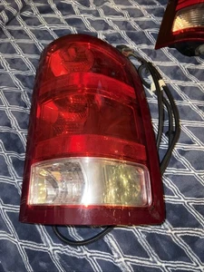 2007-2013 GMC Sierra 1500 / 2007-2014 2500 / 3500 Passenger RH Tail Light OEM - Picture 1 of 3